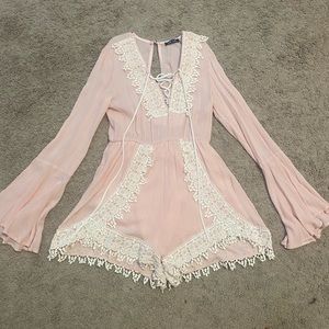 Pink and white romper
